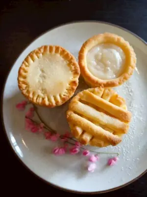 a plate of food with waffles on a table at Little Tree Hut Bangkachao in Bang Chak