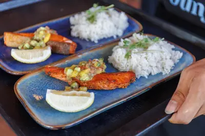a blue plate of food with rice and meat at Little Tree Hut Bangkachao in Bang Chak