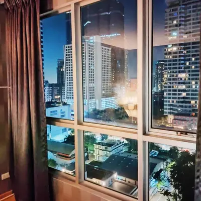 a view of a city skyline from a window at MahaNakhon Silom Sathon in the heart of Bangkok in Bangkok