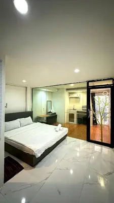 a large bedroom with a large bed in it at Chubby5room12 in Ban Bang Phlat