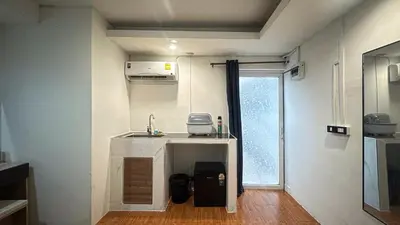 a small kitchen with a sink in a room at Chubby5room12 in Ban Bang Phlat