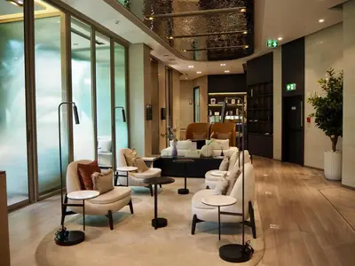 a salon with couches and chairs and a waiting room at The Crest Park Residences Monthly Rent only #2BR Apartment at Chatuchak #MrtBts in Bangkok