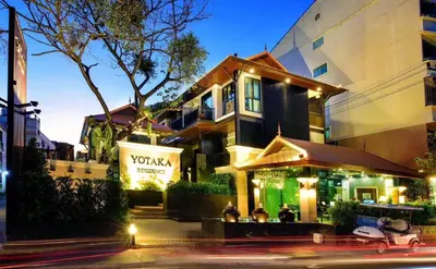 a building with a vaughan restaurant on the street at Yotaka Bangkok Hotel in Bangkok