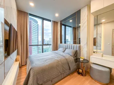 a bedroom with a bed and a large window at Luxury Residence in Central of Bangkok Siam Paragon Central World in Pratunam