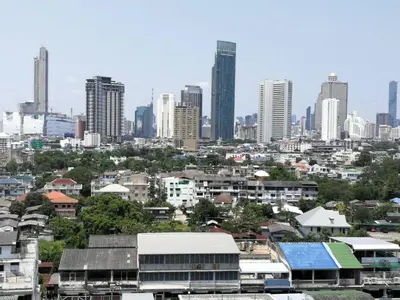 a cityscape of a city with tall buildings at BKK 2 BR apt near Sathon ICONSIAM firework view in Bangkok