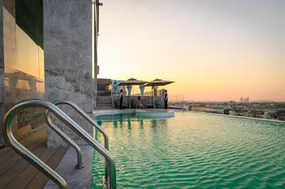 a swimming pool on the roof of a building at Maritztel Bangkok Hotel in Ban Bang Toei (1)