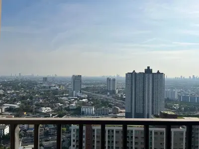 a view of a city from the balcony of a building at Convenient 1 bed condo Hua Mak in Sathani Ban Hua Mak
