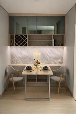 a dining room table with two chairs and candles on it at 2BR Modern Condo Office Room Sofa Bed Pool Gym in Bangkok