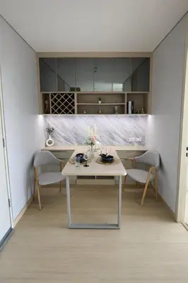 a dining room with a table and chairs at 2BR Modern Condo Office Room Sofa Bed Pool Gym in Bangkok