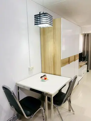 a white table and chairs in a room at Pixie Happy Room Popular Condo C5 Cozy Private Room near IMPACT Muangthong in Ban Bang Phang