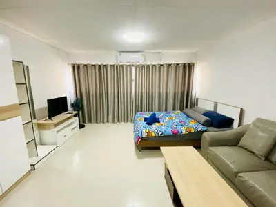 a small living room with a bed and a couch at Pixie Happy Room Popular Condo C5 Cozy Private Room near IMPACT Muangthong in Ban Bang Phang