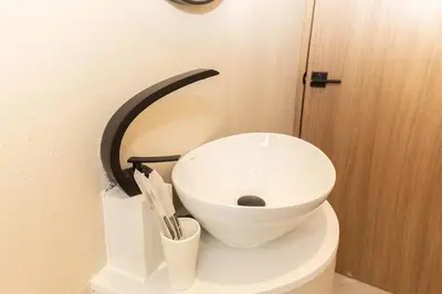 a white bowl sitting on top of a toilet at 2 Bedroom for 4 Guests Private at Center Sathorn in Bangkok