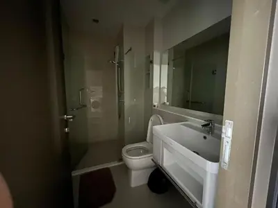 a bathroom with a sink and a toilet at 35sqm comfy condo near JJ Market in Bangkok