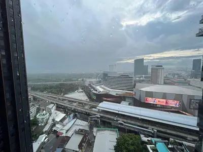a view of a city with a train station and buildings at 35sqm comfy condo near JJ Market in Bangkok