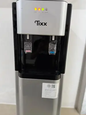 a tkx coffee machine with its door open at Bonvie Residence in Thung Maha Mek