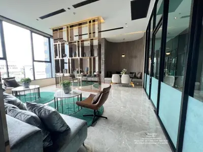 a living room with a couch and chairs and tables at New Luxury Condo 5 Min Onnut BTS - Modiz Sukhumvit 50 in Bangkok