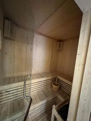 a large wooden sauna with a tub in it at New Luxury Condo 5 Min Onnut BTS - Modiz Sukhumvit 50 in Bangkok