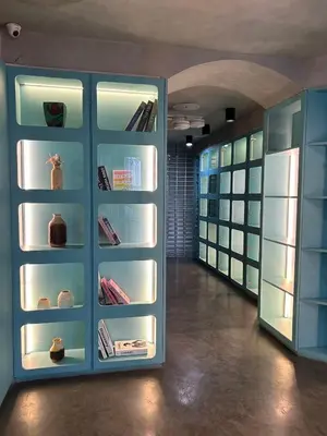 a large refrigerator with its doors open in a room at Lesbase Female 8-Bed Room in Bangkok