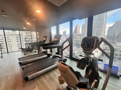 a gym with several cardio machines in a building at City life Nana - near Bumrungrad Hospital in Bangkok