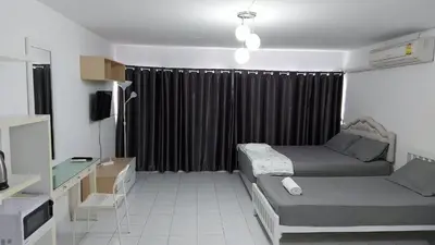a small room with a bed and a window at Hi Impact Muangthong T9 in Nonthaburi