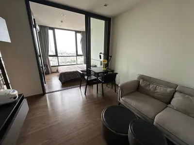 a living room with a couch and a table at High Rise Designer Gem Central Bangkok City View in Bangkok