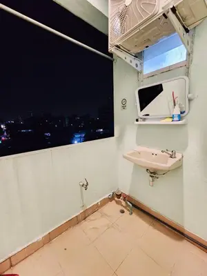 a bathroom with a sink and a window at 707-STP Homely room Free Wi-Fi and Near BTS in Sathani Bang Khen