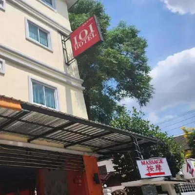 a sign on the side of a building at 101Hotel in Ban Na Song