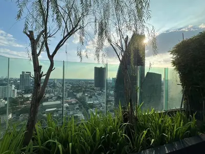 a view of a city from the top of a building at BTS Skytrain Thonglor station sukhumwit 36-38 in Bangkok