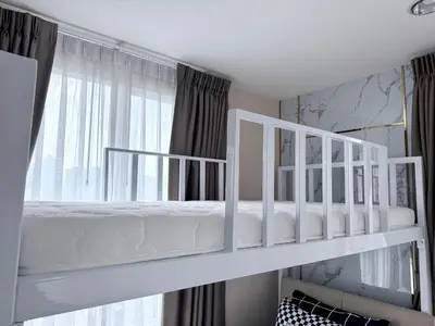a white bunk bed in a room with a window at Page65-Bangkok Urban Light & City Rhythm -Ekkamai in Bangkok