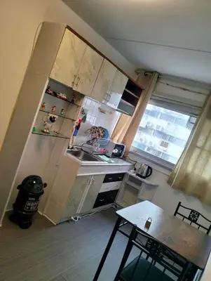 a small kitchen with a sink and a stove at IMPACT popular condo แม่ตัง in Ban Bang Phang