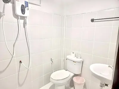a bathroom with a shower and a toilet and a sink at Znap Yaowarat - MRT Wat Mangkon in Samphanthawong