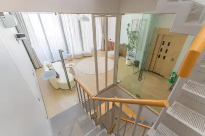an overhead view of a bathroom with a glass door at Heart \u7d20\u5764\u903836 Chewaheart Sukhumvit 36 in Bangkok