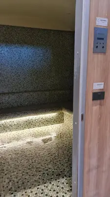 a bathroom with a shower with a tiled floor at Perfect WFH 5 mins THONG LOR ultra luxury in Bangkok