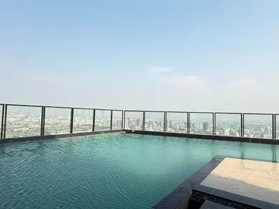 a swimming pool on the top of a building at Bangkok Rama9 Cassia & Siamese in Bangkok