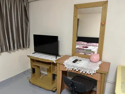 a room with a desk with a computer and a mirror at Impact Arena C3 by Jintana in Ban Bang Phang