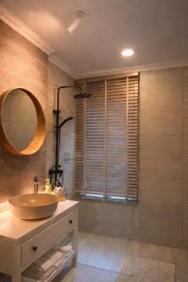 a bathroom with a sink and a mirror at Feel Private Pool Villa in Ban Lam Praya Phai Rua