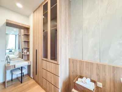 a bathroom with a sink and a mirror at Luxe City Condo in Central Bangkok in Pratunam