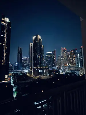 a view of a city skyline at night at Bright thonglor in Khlong Toei