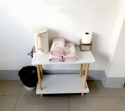 a white table with rolls of toilet paper on it at XX Oh My Nap Sukhumvit 3 - นานาเหนือ in Makkasan