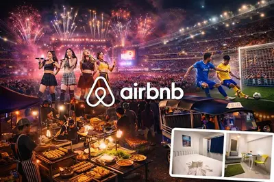 a group of people standing in a stadium with fireworks at Best Value Condo Lumpini Rajamangala in Sathani Khlong Tan
