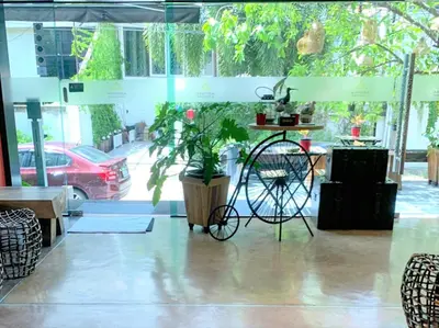 a shop with a bike parked in a room at Aspira D'Andora Sukhumvit 16 - Asoke in Bangkok