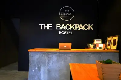 a sign that says the backpack hospital with a laptop at The Backpack Hostel in Bangkok
