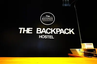 a sign for the backpack hospital on a wall at The Backpack Hostel in Bangkok