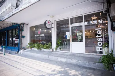 a store front of a building with a storefront at Movylodge in Bangkok