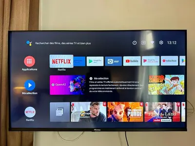 a television screen with a bunch of different websites at Dinsomon Hotel in Bangkok