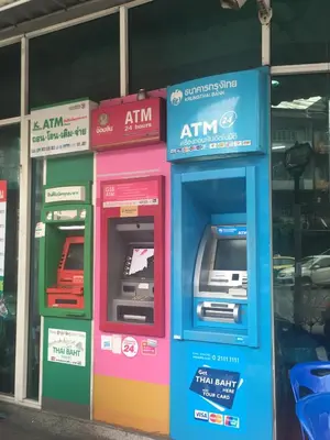 two atm machines sitting in front of a store at Diamond Bangkok Apartment in Bangkok