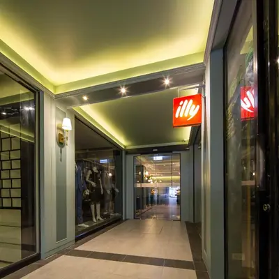 a store hallway with a mris sign on the wall at The Mulberry Bangkok Khaosan Road in Bangkok