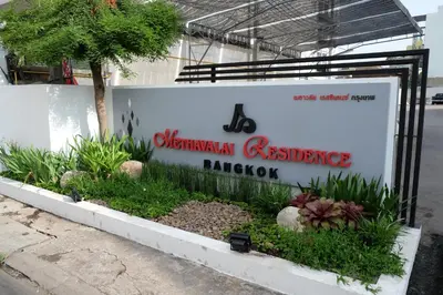 a sign for a sultanian exchange barbecue restaurant at Methavalai Residence Hotel in Bangkok