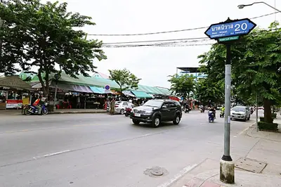 a street sign on the side of a city street at T3 Residence in Bangkok