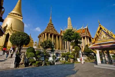 a group of buildings with spires on top of them at Prasuri Guest House in Bangkok